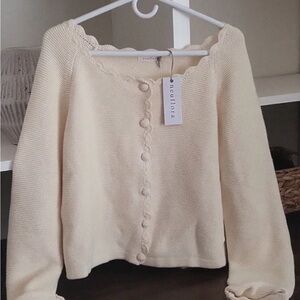 Neuflora’s Nora Cardigan Cream, 100%cotton.